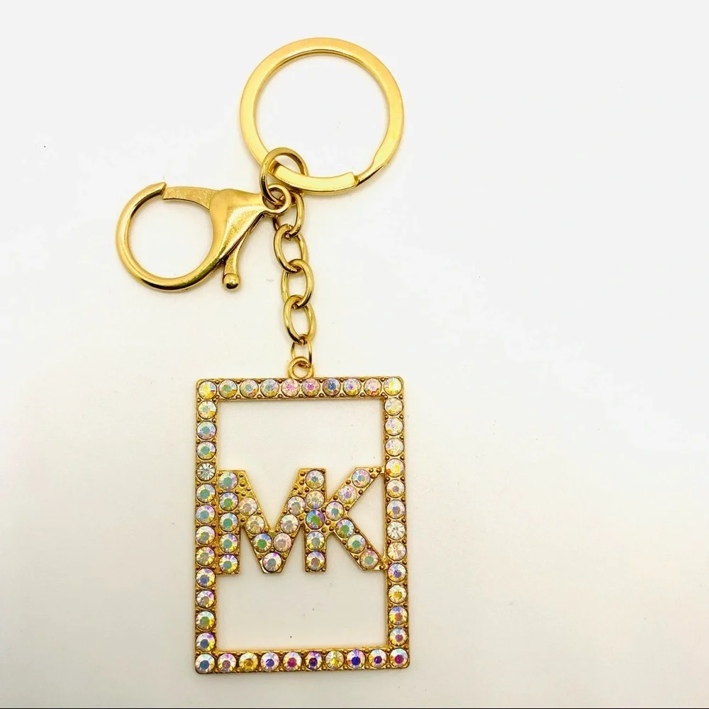 Purse Charm Key Chain MK in Iridescent Crystals set in golden tone. BRAND NEW